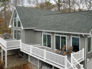 Two-story home with gray asphalt shingle roof