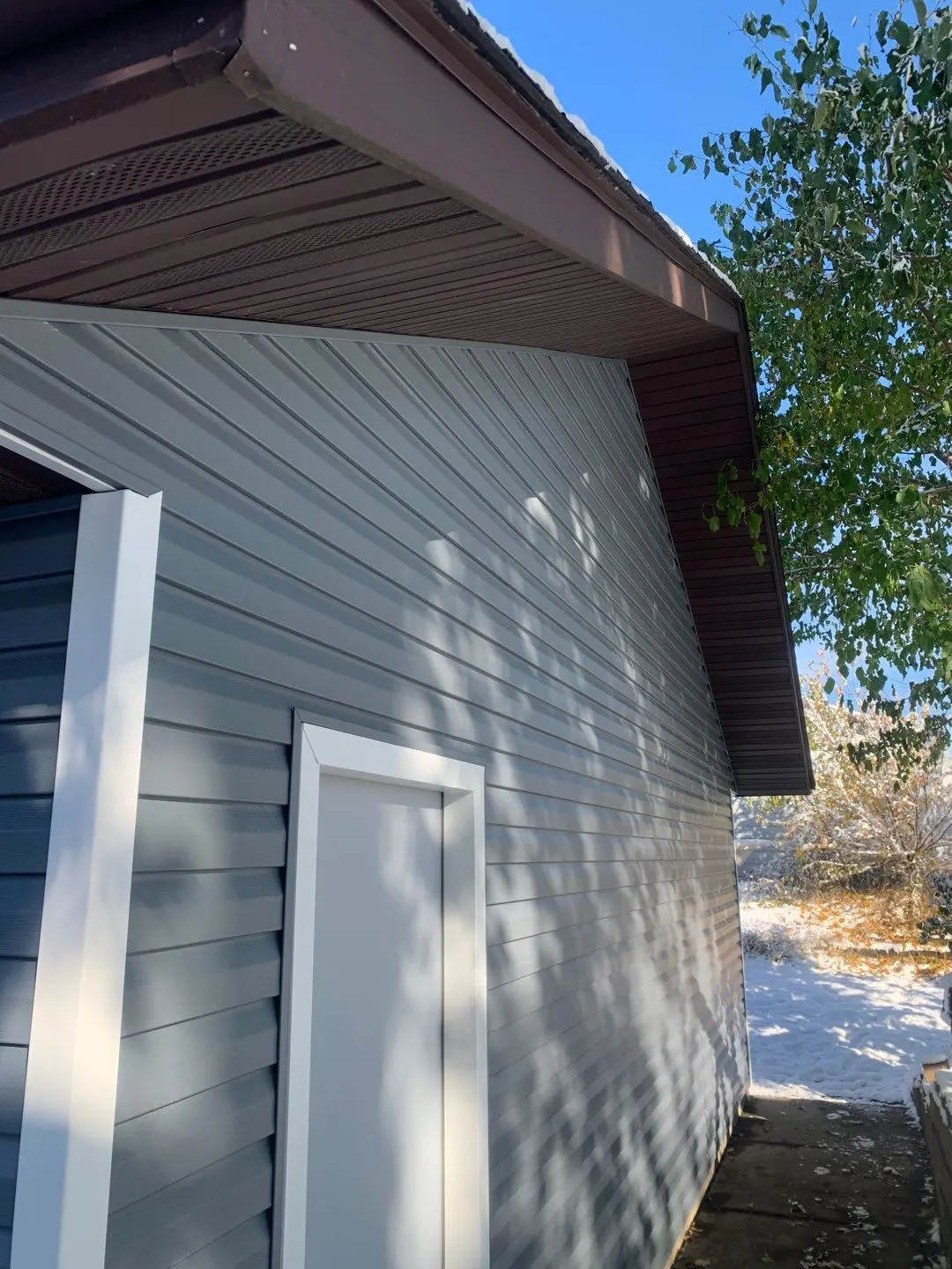 home renovation contractors installed green board and batten siding in Brownsville, WI | Exterior Pros